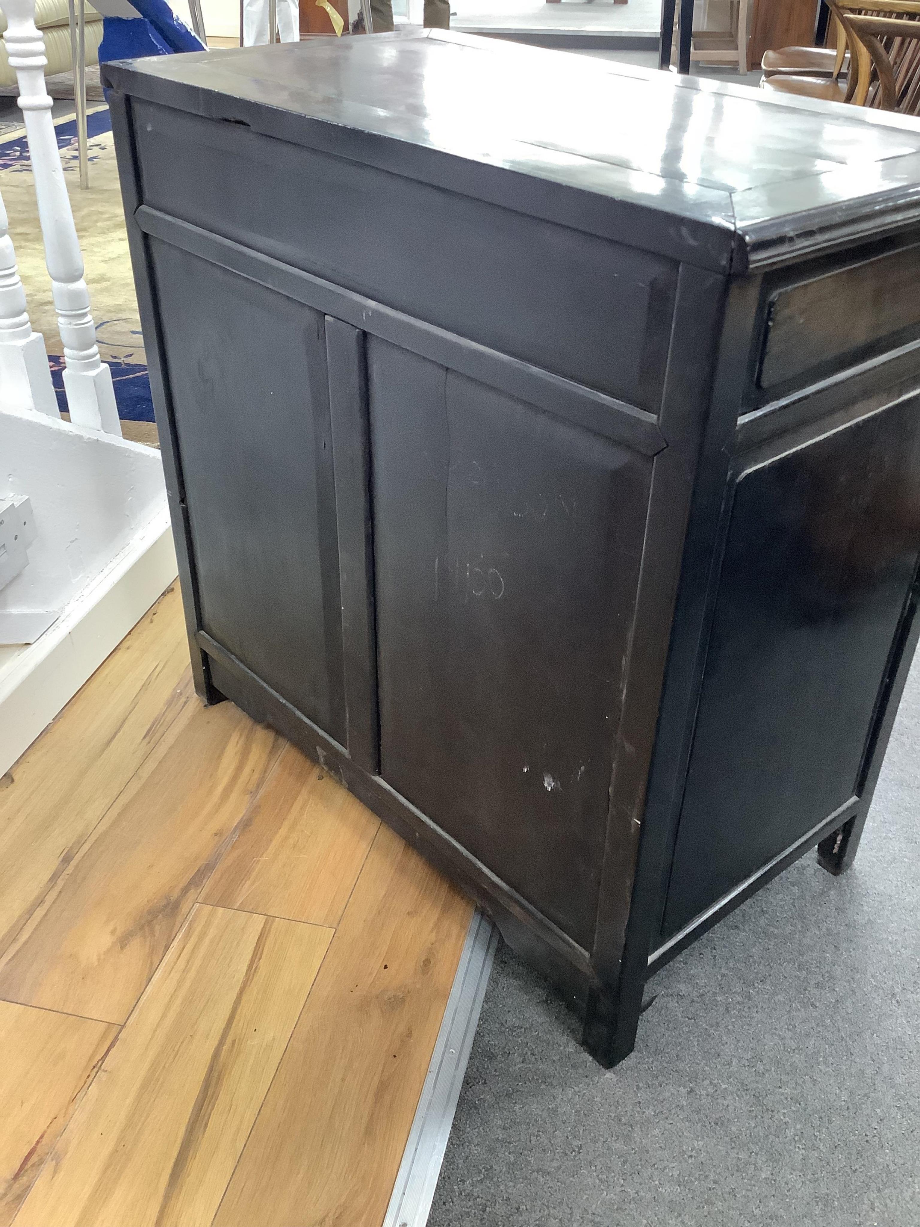 A Chinese hardwood low cabinet, width 77cm, depth 42cm, height 77cm. Condition - fair